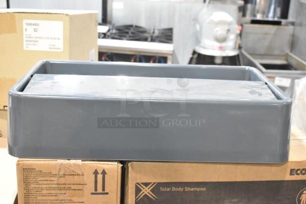 Four brand new gray Poly Swinging Slim Jim trash can lids, unmarked, in pristine condition, sold as a set.