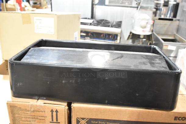 Brand new Poly Swinging Slim Jim trash can lid, black, rectangular, durable plastic, unopened boxes.