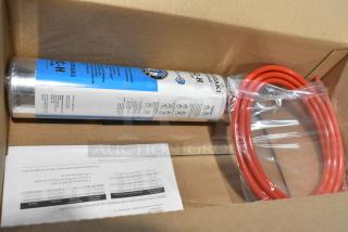 Brand new H9320-51 water filtration system in box, includes filter cartridge and coiled red tubing, with instruction manual.
