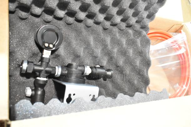 BRAND NEW H9320-51 water filtration system in protective packaging, complete with mounting bracket and accessories.