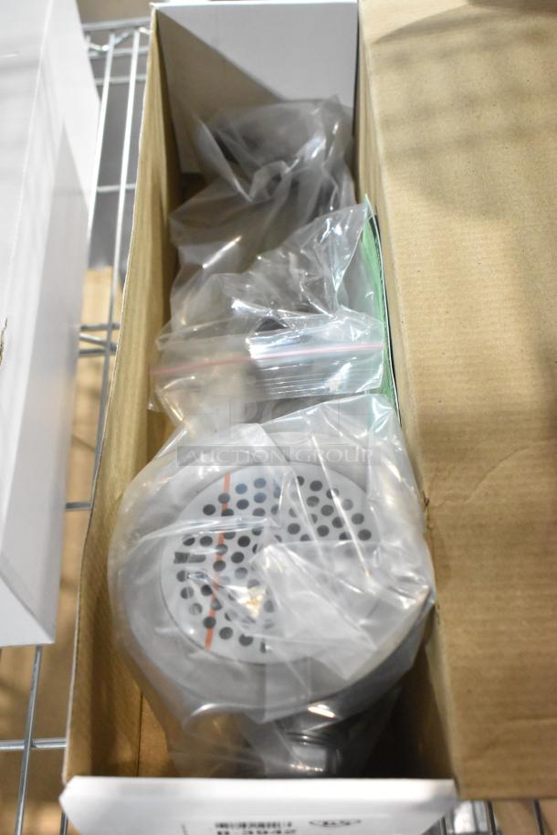 2 brand new T&S Brass B-3942-01 Waste Twists in original packaging, displaying drainage parts.