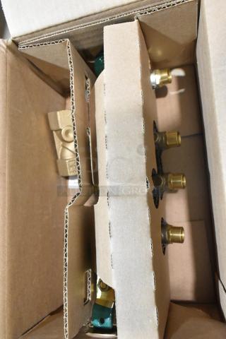 Brand new Watts 007M2QTS-3/4 double check valve assembly in box, featuring brass fittings and durable construction.