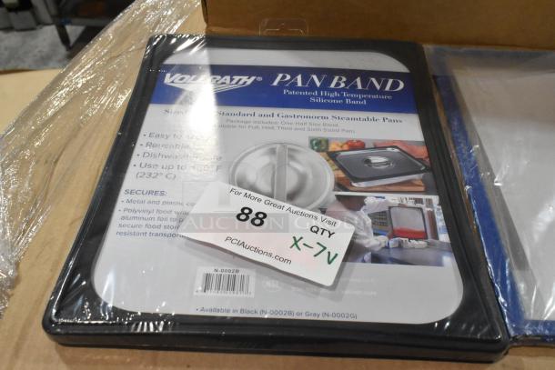 7 brand new items, featuring Vollrath Pan Band lids, sealed in packaging. Silicone bands, high temperature, dishwasher safe.