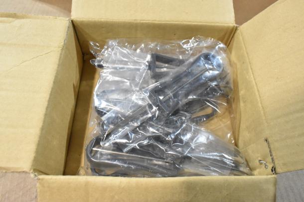 Box of brand new Adcraft VP-6/B vegetable peelers in plastic packaging, unopened.