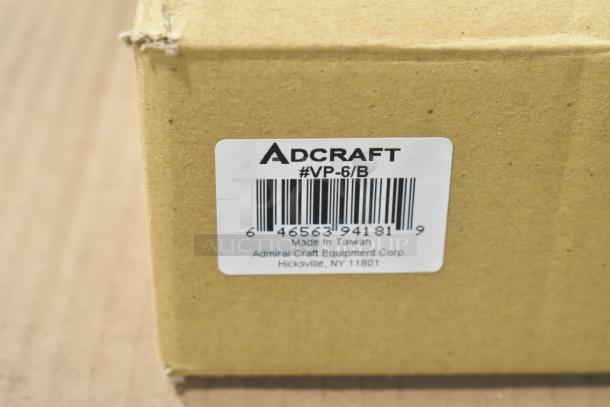 Box of new Adcraft VP-6/B vegetable peelers, labeled with barcode and manufacturer details, made in Taiwan.