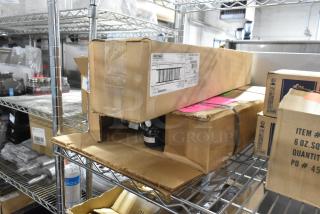 Two brand new items: Rational R195-CL Water Filtration System and Pentair QTI1+CR Filter in original packaging.