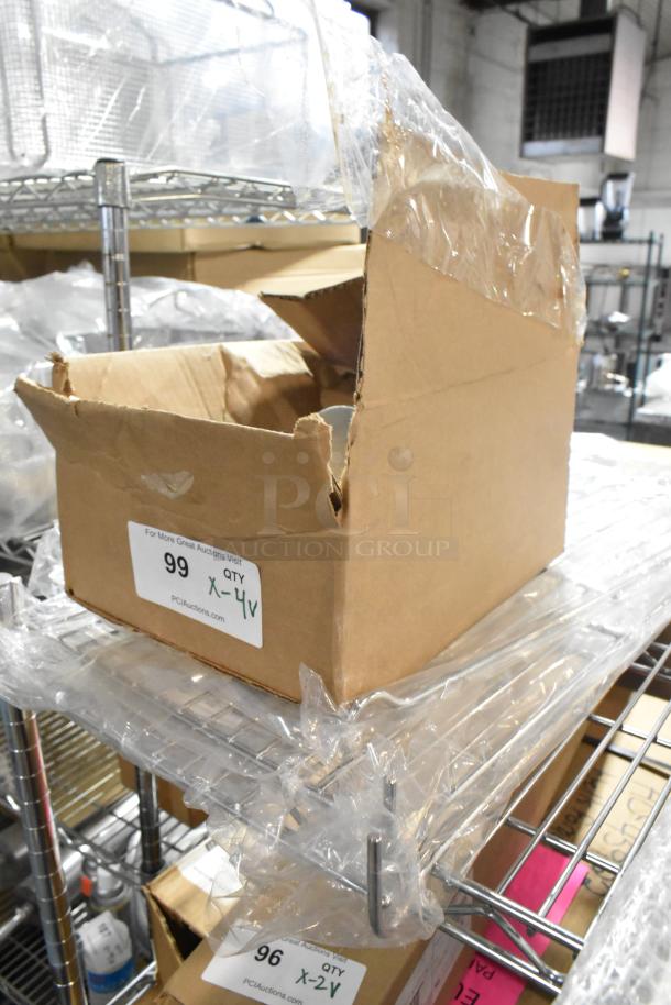 Brand new metal legs and racks set, partially visible in open box. Box label: Quantity 4, PCI Auctions.