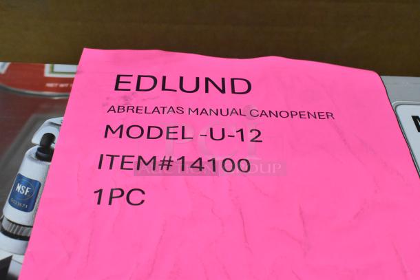 Brand new Edlund U-12 manual can opener, model #U-12, item #14100, with NSF certification visible on tag.