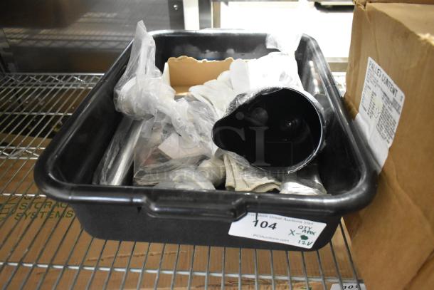 Plastic bin with 12 new items including funnels, gloves, and a pail opener. Includes auction label "104 QTY 12X".