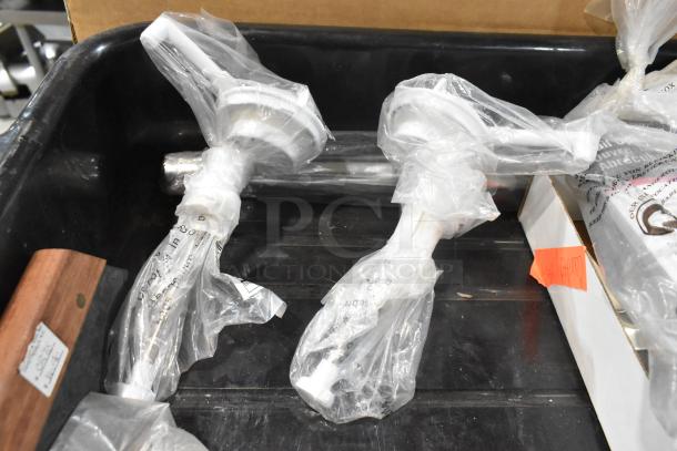 Set of 12 brand new items, including funnels, gloves, and pail opener, in original packaging, on auction display.