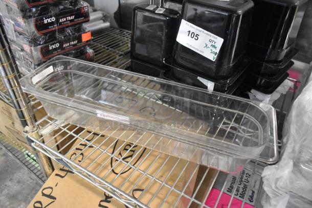 Alt text: New clear and black poly drop-in bins on metal shelf, includes labeled ash trays and bin tags indicating quantity.