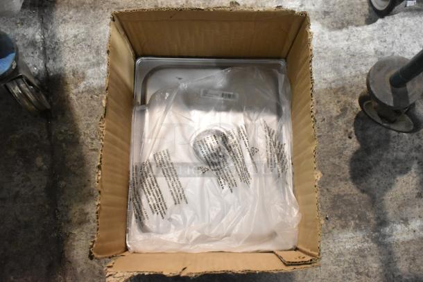 Box of 15 brand new items, including stainless steel drop-in bin lids in packaging, placed on a concrete floor.