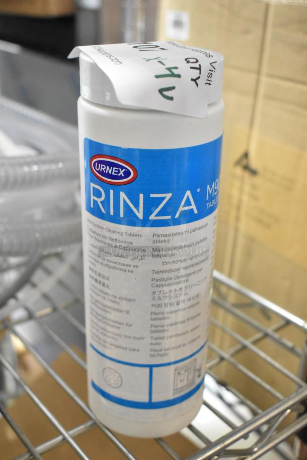 Brand new Urnex Rinza cleaning tablets, sealed container, visible label. Includes 4 items: Rinza, Sprayon grease, hose.
