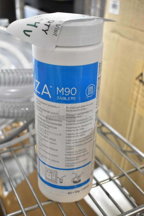 "Rinza Urnex M90 Tablets, new, in bottle. Includes Sprayon food-safe grease and hose. Auction lot, 4 items total."