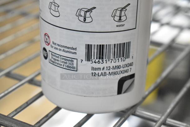 4 brand new items: Rinza Urnex tablets, Sprayon food-safe grease, hose. Label notes not for aluminum use, item #12-M90-UX040.