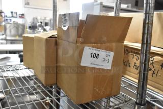 Three brand new items in a box labeled "108 QTY X-3" on a metal shelf, including TK-CBW set, unopened and in prime condition.