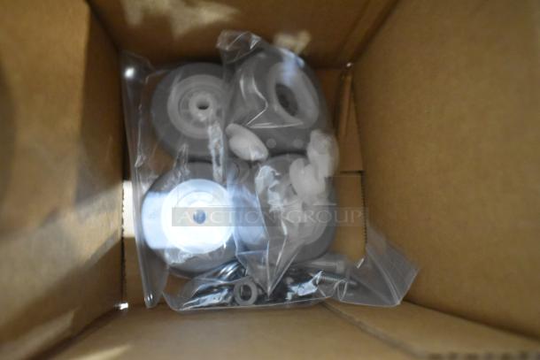 Brand new TK-CBW set in sealed plastic bags inside a cardboard box. Includes wheels and hardware components.