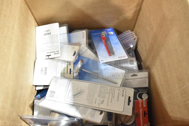 Box of 57 new thermometers in packaging, featuring brands like Taylor. Includes oven and wall thermometers, labeled for HACCP compliance.