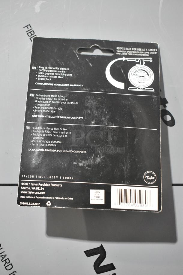 Packaging for Taylor Precision Products thermometer, model 5980N. Features include easy-to-read dial, HACCP guidelines, stainless steel construction, and one-year warranty.