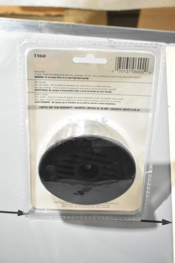 Packaged TM60 item, showing back with usage instructions and barcode. Includes a one-year limited warranty. Brand new condition.