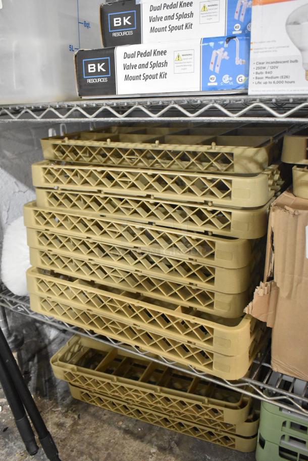 23 brand new poly dish caddies stacked on metal shelves, alongside BK Resources dual pedal knee valve kits.