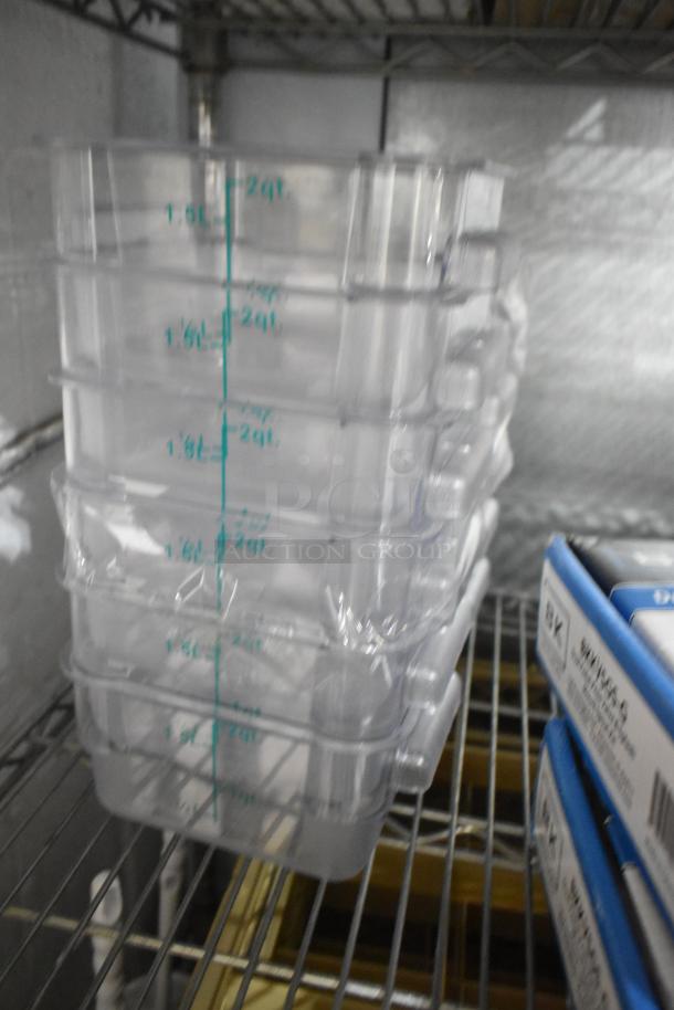 Brand new poly containers with visible measurements, stacked on shelving. Includes Windo WHW-4 scoop holders.