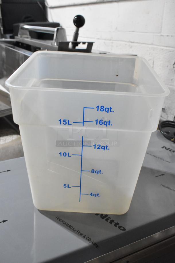 Clear poly container with blue measurement markings up to 18 quarts and 15 liters, new condition.