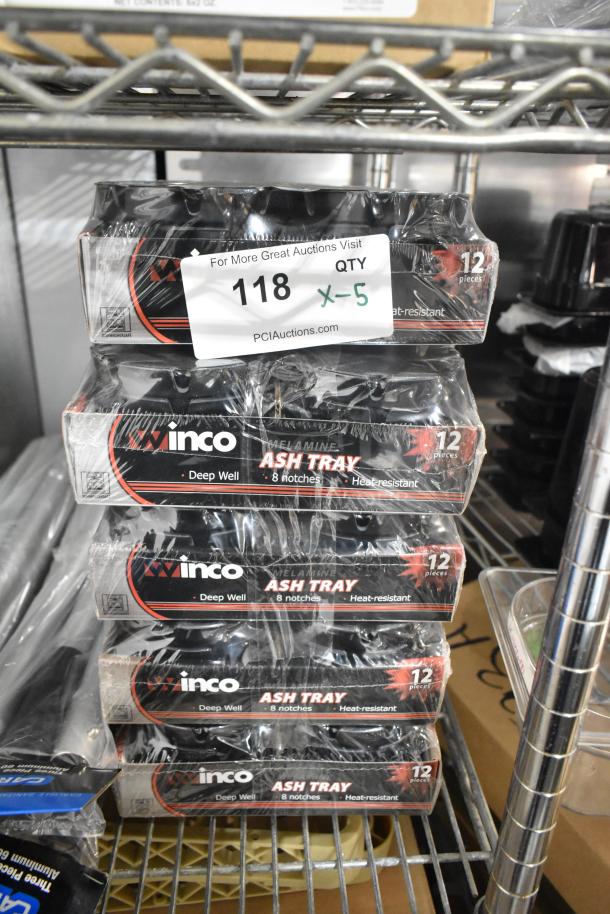 Five new Winco ashtray boxes, each with 12 heat-resistant, deep-well ashtrays with 8 notches, stacked and labeled "x5" for auction.