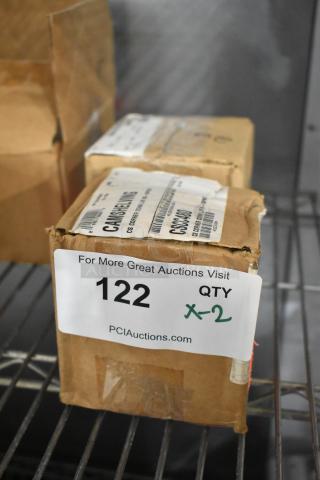 Two brand new Camshelving corner connectors in boxes, labeled for auction lot 122, quantity x2.