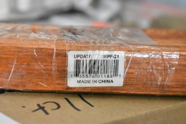 Brand new kitchen items including Dexter 3" oyster knives, Cambro TG6110 tongs, Update steak forks, Winco SP73DS drainer shelves, with protective packaging. Barcoded label reads "UPDATE WPF-21, Made in China."