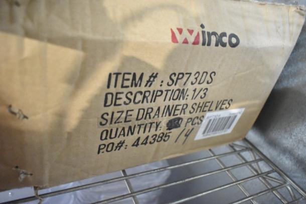 Cardboard box labeled "Winco," item #SP73DS, contains drainer shelves, quantity 3, new condition.