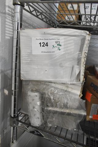 Box of 16 brand new dough dockers, still in packaging. Box label indicates auction lot number 124.