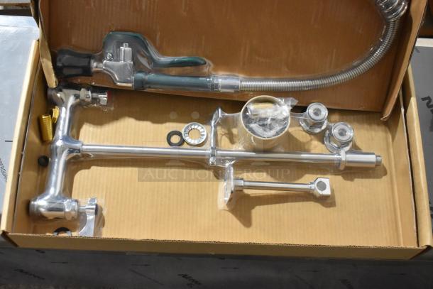 Brand new Krowne spray faucet nozzle, chrome finish, with hose and fittings in original packaging.