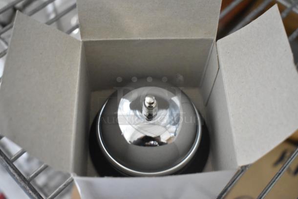 Brand new Tablecraft metal call bell in open box. Reflective silver finish with polished surface. Quantity: 5.