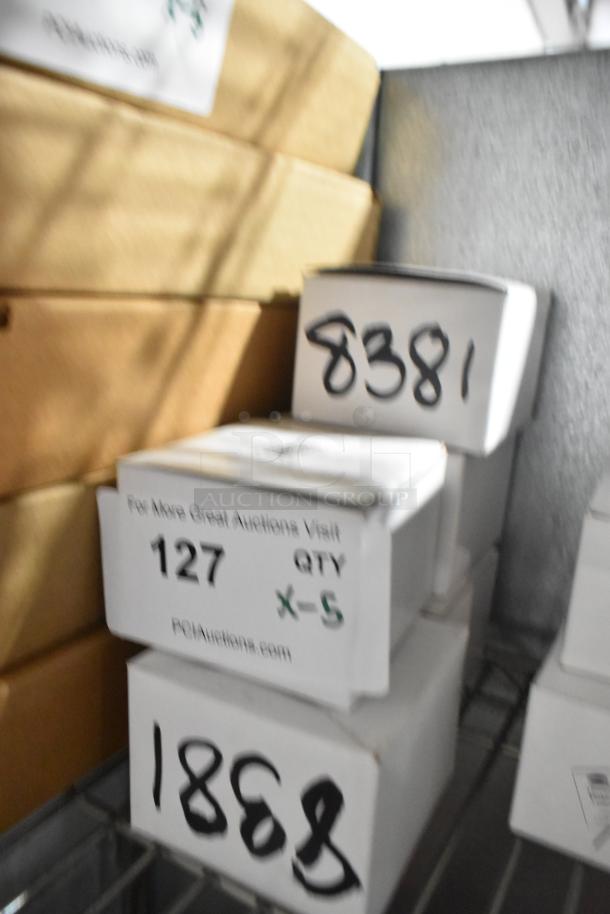 5 brand new Tablecraft metal call bells in white boxes, labeled "127 QTY X-5."