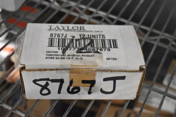 Box of Taylor dishwasher labels, model 8767J, 12 units. Marked as temperature sensitive, store below 110°F.