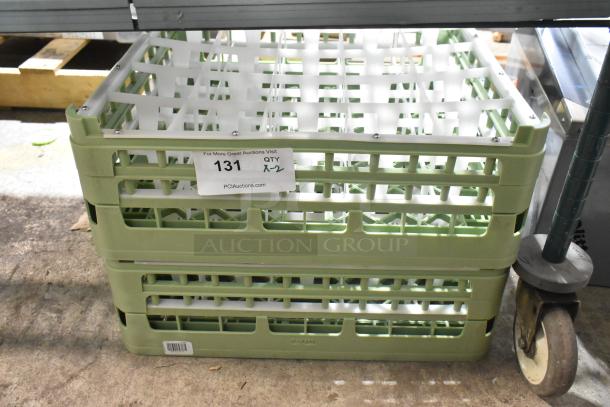 Brand new poly dish caddies, set of two, in mint condition. Includes auction label "131, QTY x 2," from PCI Auctions.