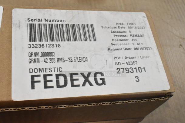 Box labeled "Hatco GRNM-42," containing 5 new 42" L single tubular metal heating rods. Serial: 3323612318.