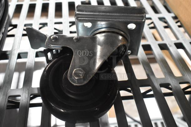 Brand new Metro 5M swivel caster with visible "QDJS" marking. High-quality build, perfect for versatile movement.