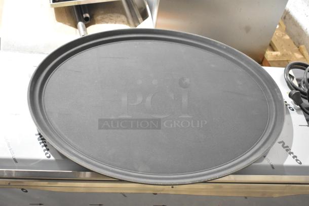 Brand new Update GT-2700BK black oval serving tray in pristine condition. Durable design, ideal for serving.