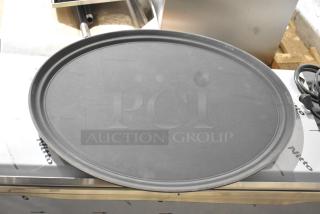 Brand new Update GT-2700BK black oval serving tray in pristine condition. Durable design, ideal for serving.