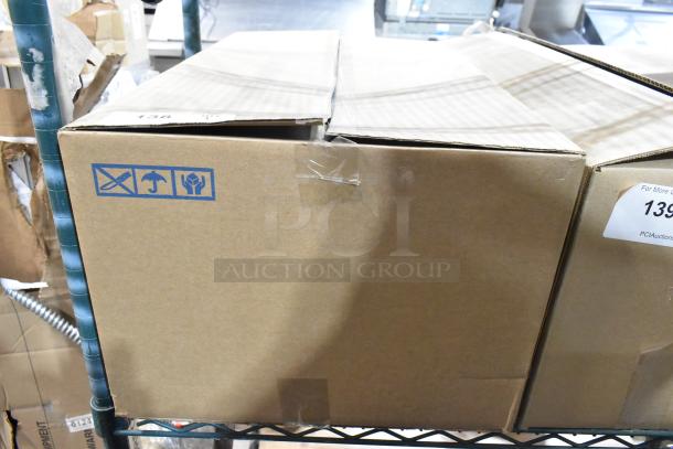 Box of 6 new Wear-Ever 10376861 skillets and 6 Vollrath 382170 7-quart sauce pans. Sealed in original cardboard packaging.