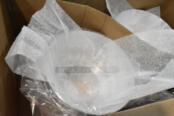 Box of Wear-Ever 10376861 metal skillets and Vollrath 382170 sauce pans, brand new with protective packaging.