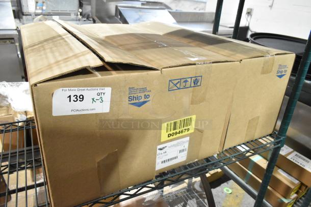 Box containing 3 brand new Vollrath C1-L-VS LidSavers on a metal shelf. Label shows quantity of 3 units.