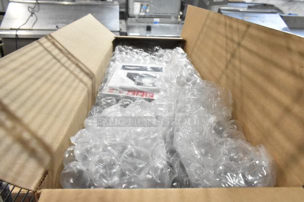 Box containing three brand new Vollrath C1-L-VS LidSaver units, surrounded by bubble wrap for protection.