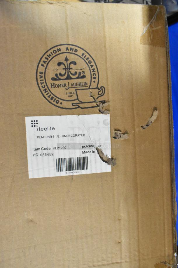 Cardboard box with Steelite label showing item code HL21200, "Plate NR 6 1/2 Undecorated," shipping info partially visible.