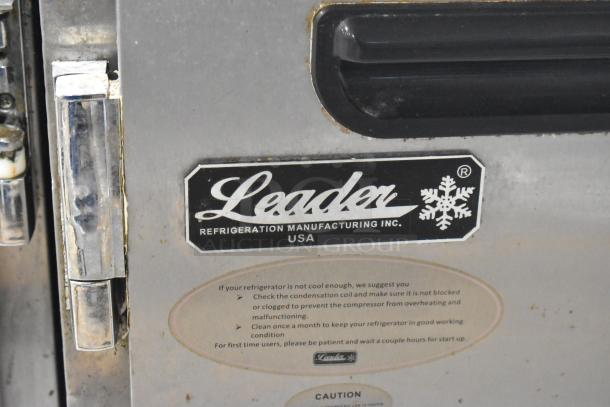 2018 Leader ESLB36SC Stainless Steel 2 Door Undercounter Cooler, features label with care instructions, uses 115 Volts.