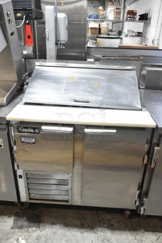 Leader LM36 S/C stainless steel commercial sandwich salad prep table with Bain Marie Mega Top. Mounted on commercial casters.