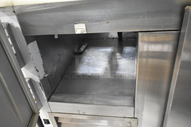 Leader LM36 S/C stainless steel commercial sandwich salad prep table, bain marie mega top, shown open, on casters.