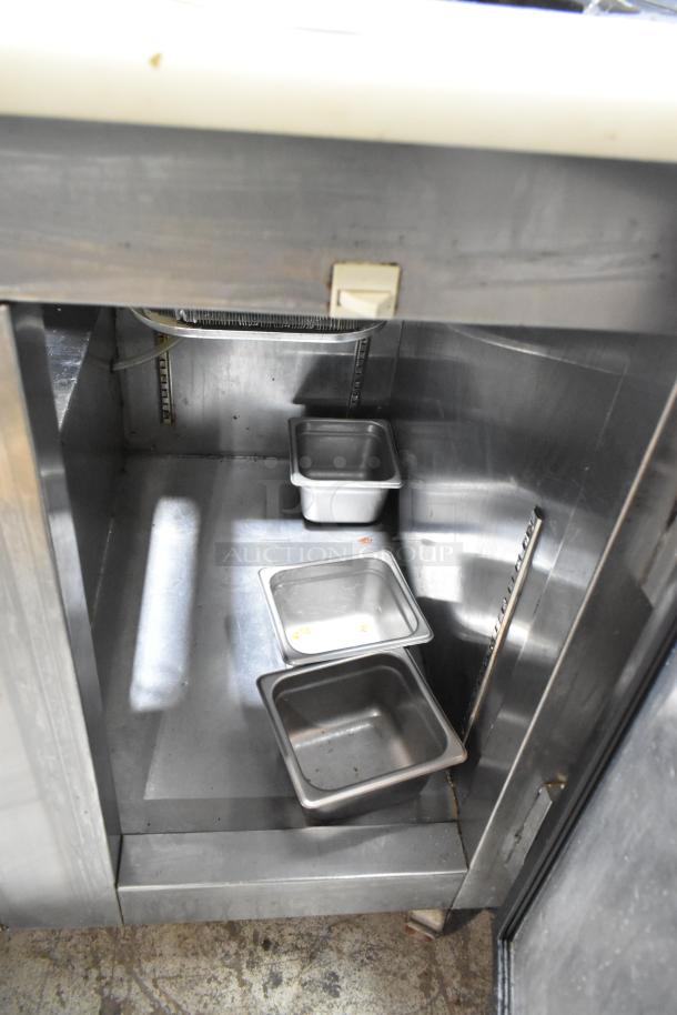 Leader LM36 S/C stainless steel prep table with bain marie top, commercial casters, interior stainless pans, 115V, 1 phase.